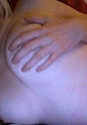 Picture collection of a blonde cutie displaying her nice round juggs