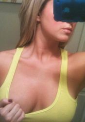 Photo gallery of a sexy big-tittied amateur chick camwhoring