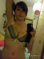 Selection of a busty cutie posing sexy while camwhoring