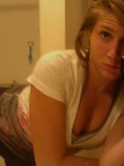 Amateur blonde chick teasing while camwhoring at home