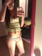 Amateur lovely brunette teen taking topless mirror pics