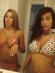 Photos of two amateur sexy teen lesbo lovers posing