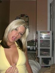 Pictures of a naughty blonde babe displaying her fine tits