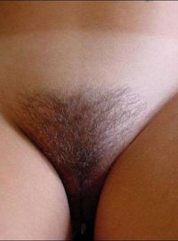 Brunette amateur babe with hairy pussy and big tits