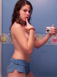 Slutty brunette teen GF selfshoots in the bathroom