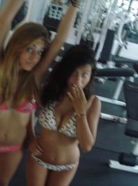 Two sexy amateur teens taking selfpics one hot summer